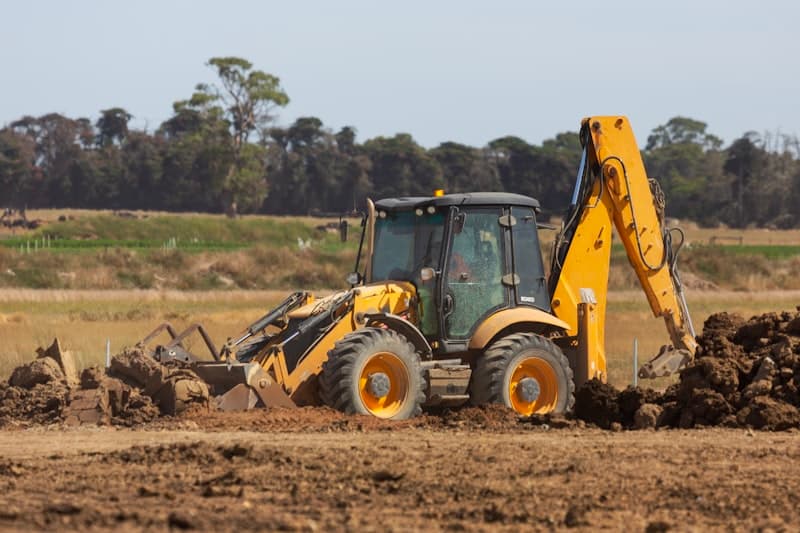 Excavator digging a foundation trench