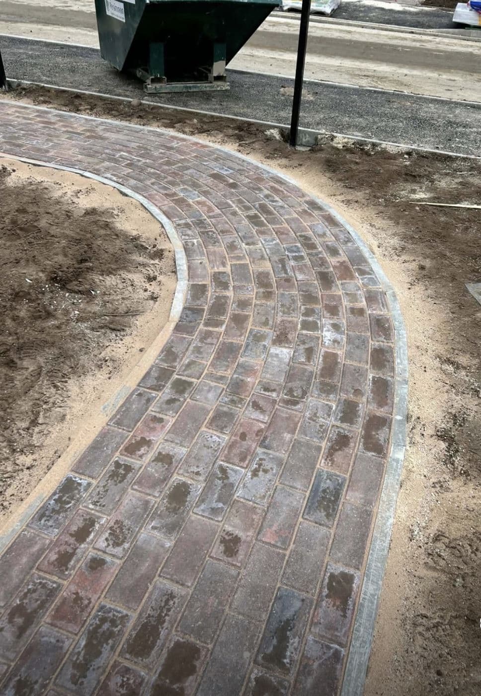 Curved clay paver pathway with edging course, Norfolk